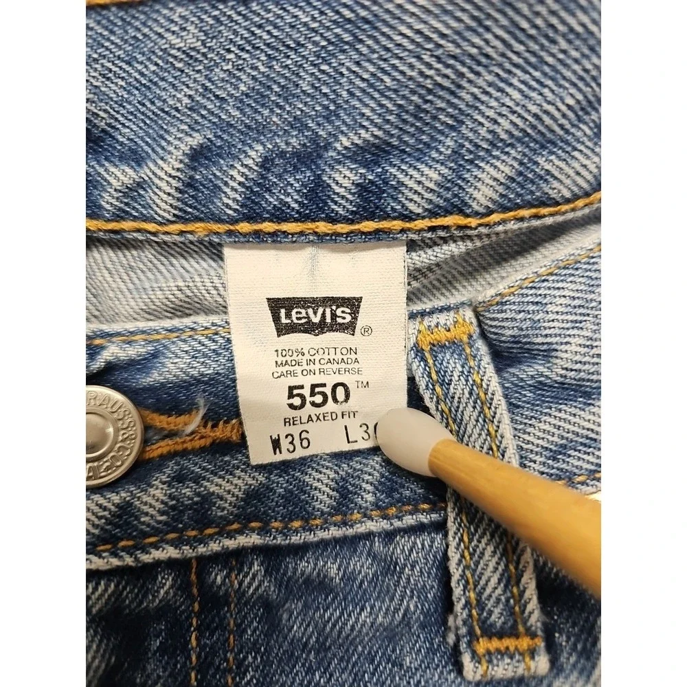 Levi's 550 Mens Blue Relaxed Tapered Vintage Denim Jeans Fading Stained Sz 36x30